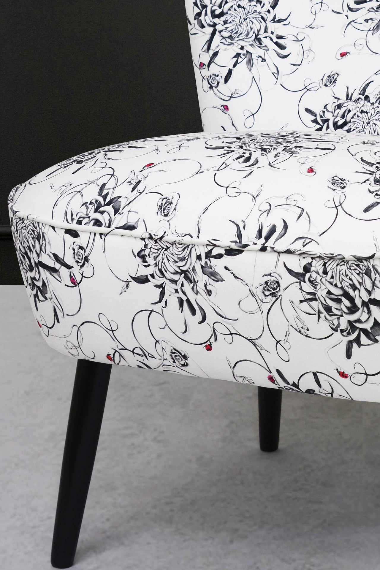 Cocktail chair upholstered with Floral chrysanthemums and ladybird fabric.