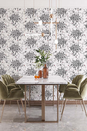 Monochrome floral wallpaper on kitchen wall.
