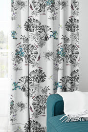 Botanical fabric with green frogs, dragon flies and fish hanging curtains.