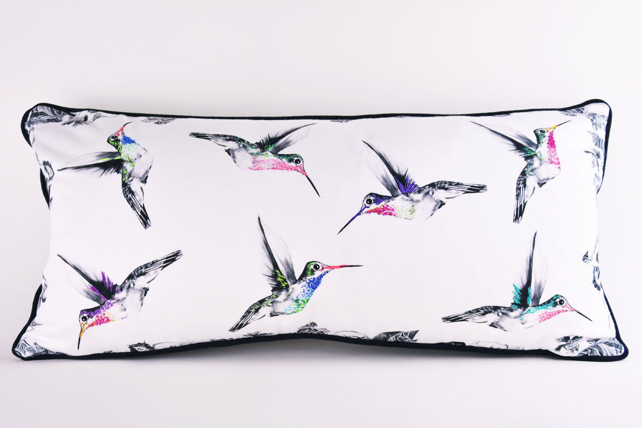 Hand embroidered hummingbird cushion.