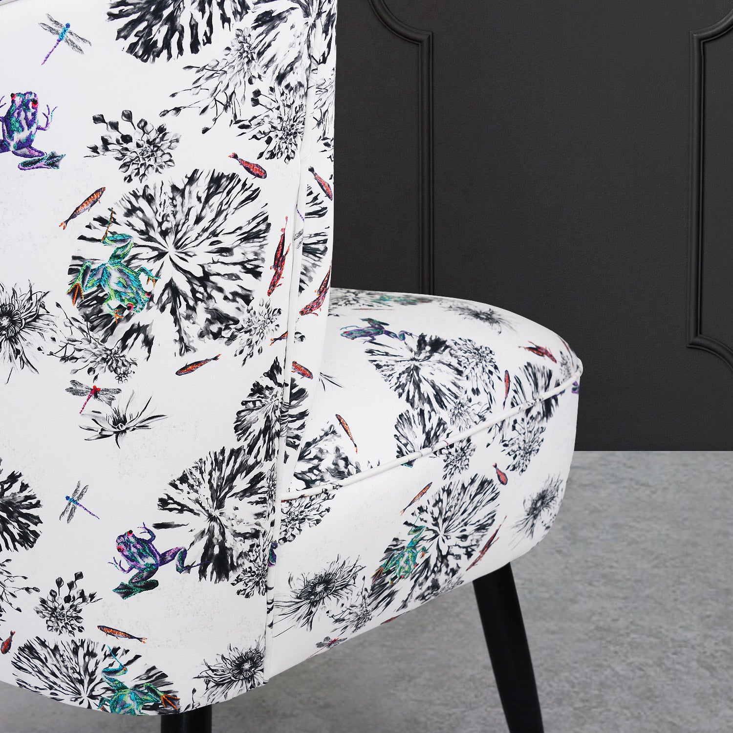 cocktail chair with multi frogs on a lily pad fabric close up