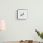 Hand embroidered bunny limited edition print in frame on the wall