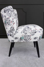 cocktail chair with multi frogs on a lily pad fabric side view