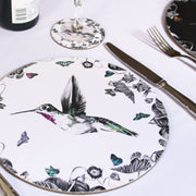 White hummingbird placemat on table