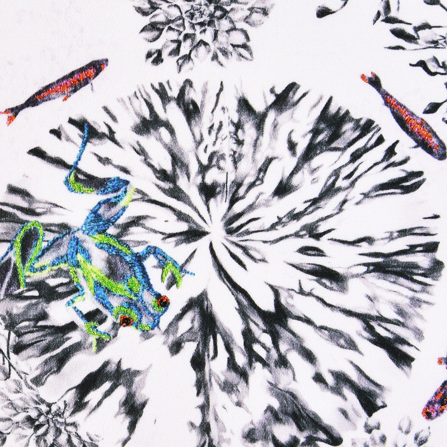 Frogs, fish, dragonfly and lily pad close up