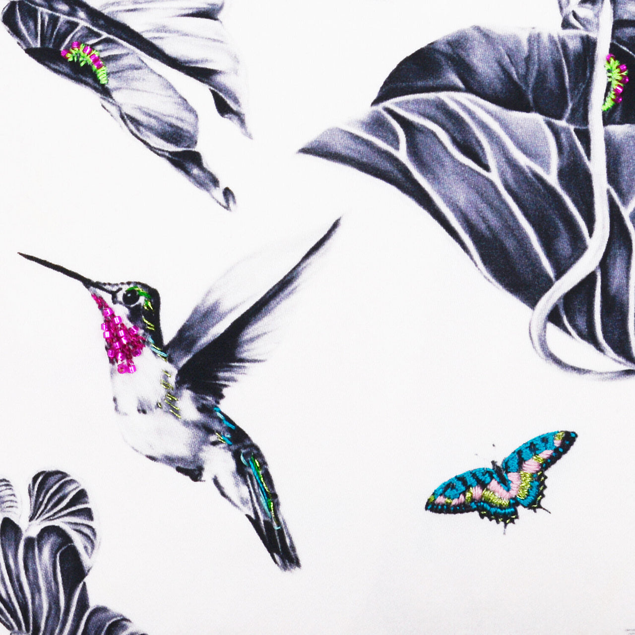 Mini cushion with Hummingbirds print and highlights of hand embroidery close up