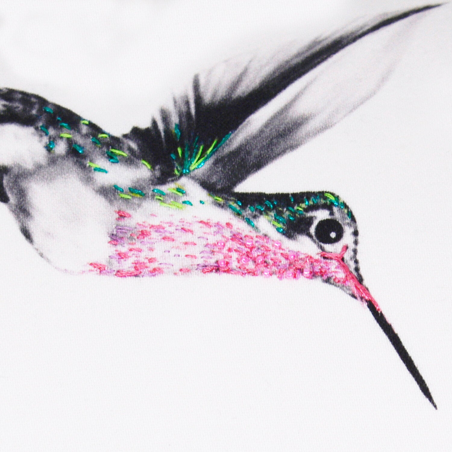 Bolster cushion with hand embroidered hummingbirds close up