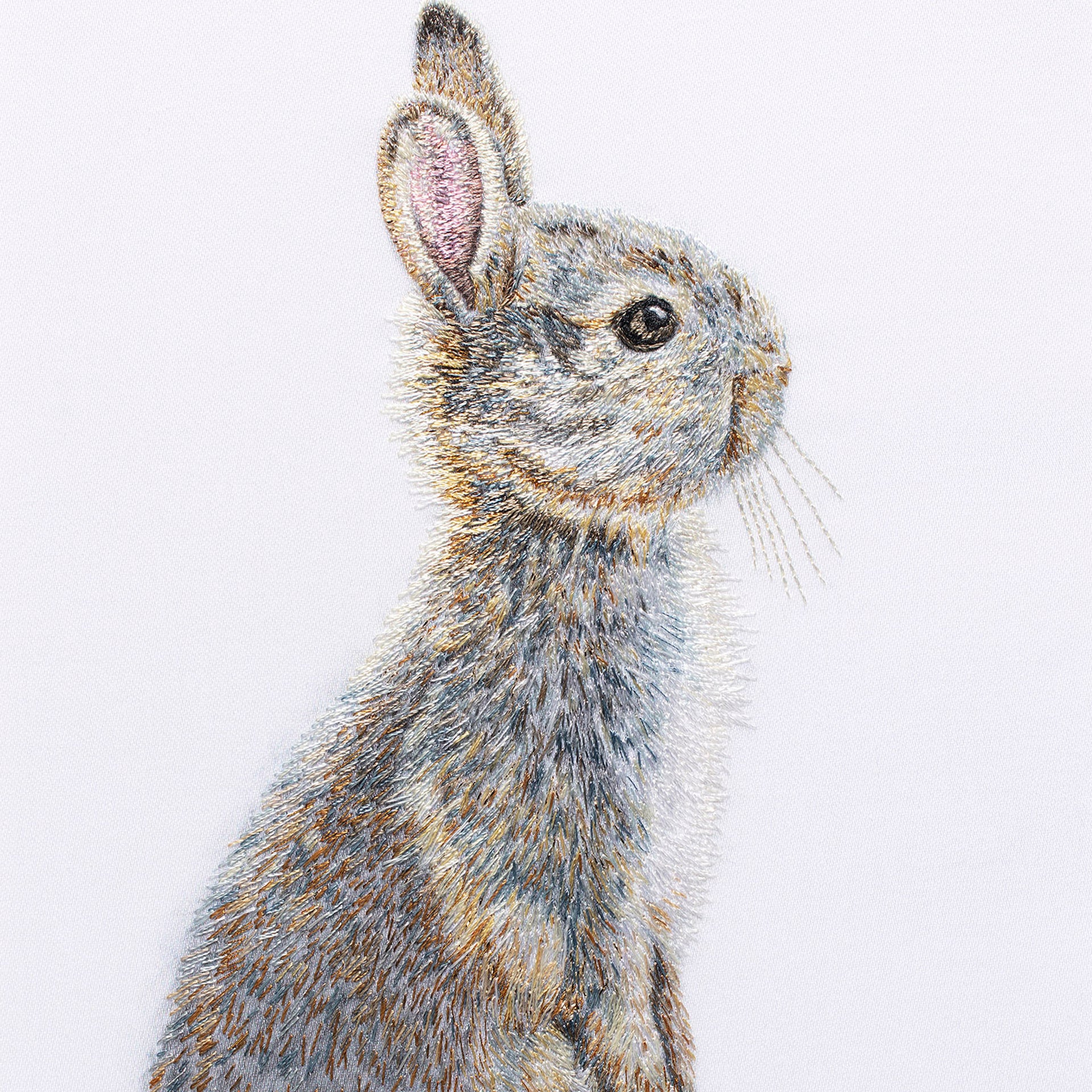 Bunny hand embroidered artwork.