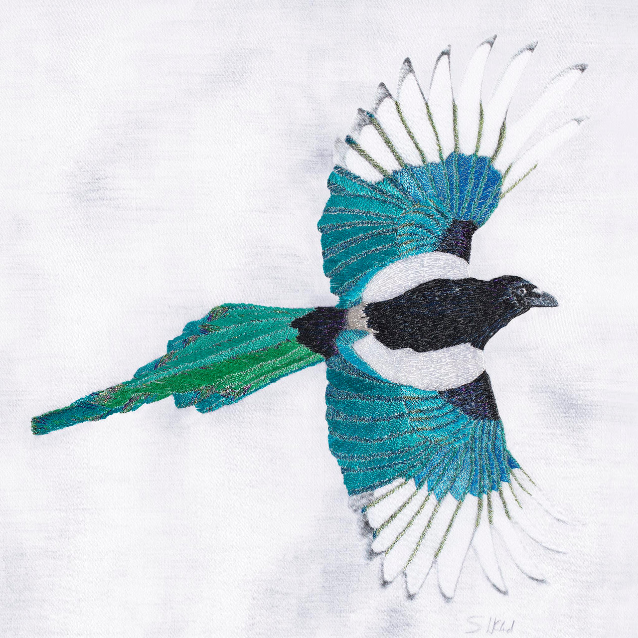 Hand embroidered flying Magpie artwork