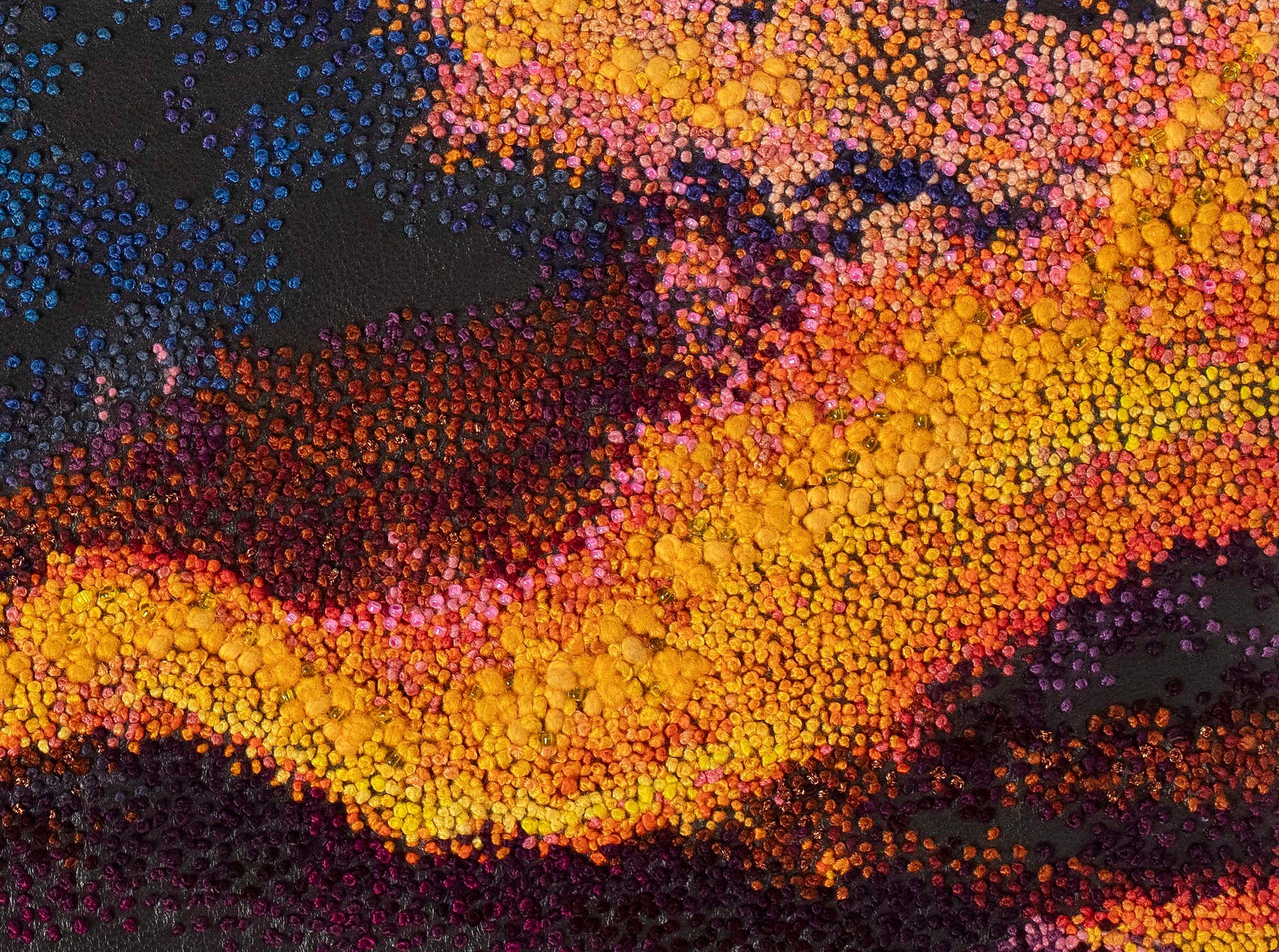 December Sky hand embroidered leather wall art close up.