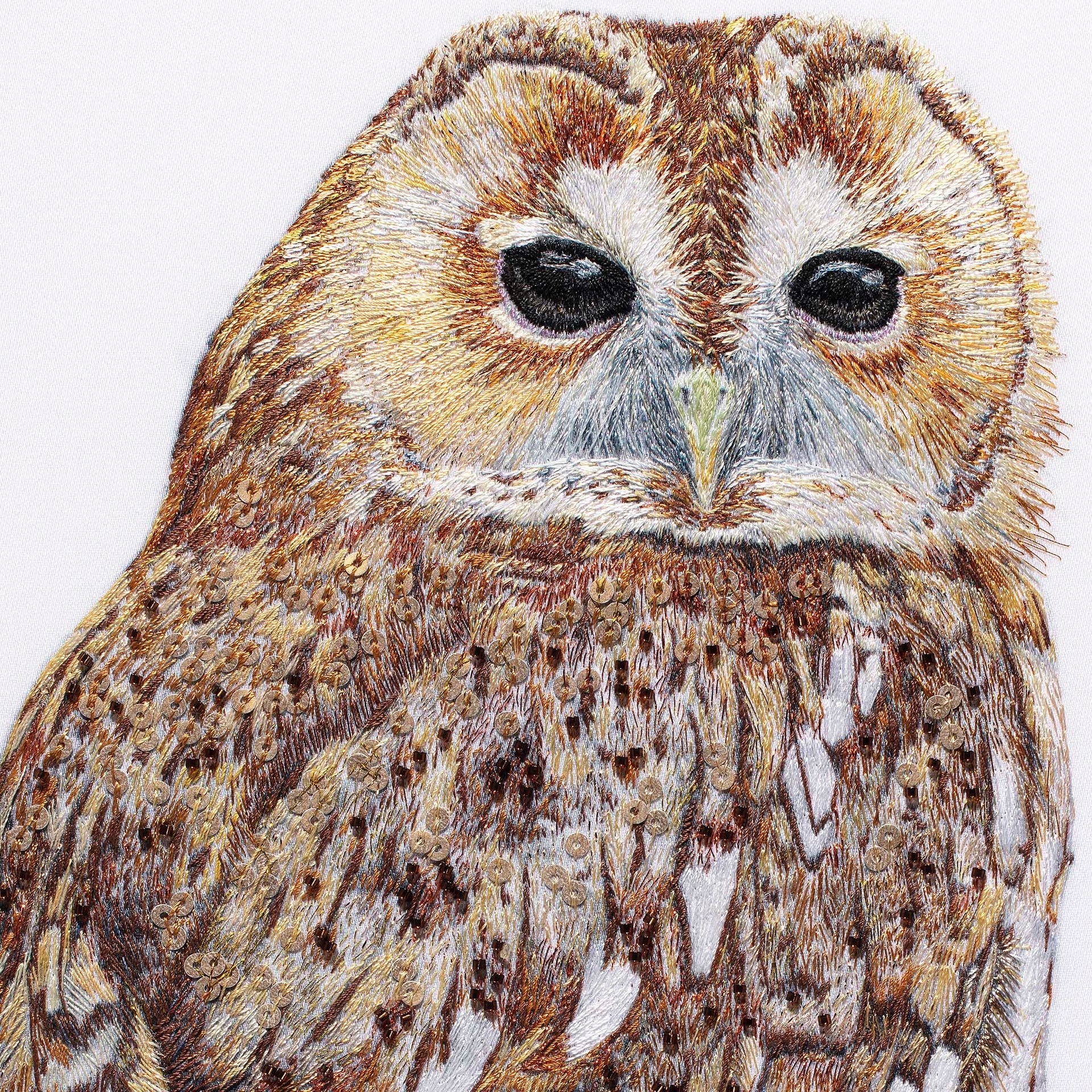 Owl pencil drawing with hand embroidery and beading artwork close up