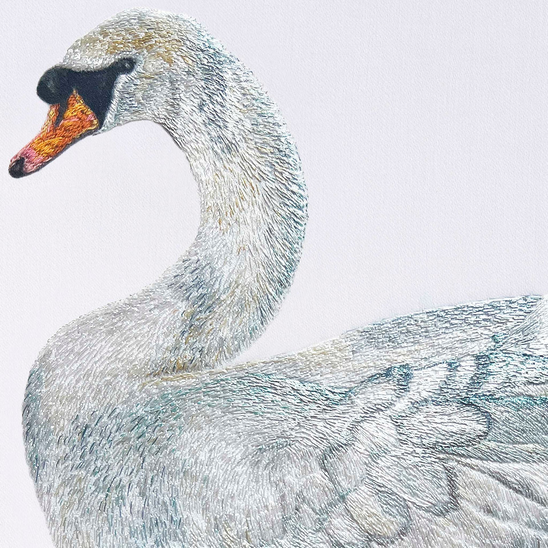 Swan hand embroidered wall art close up.