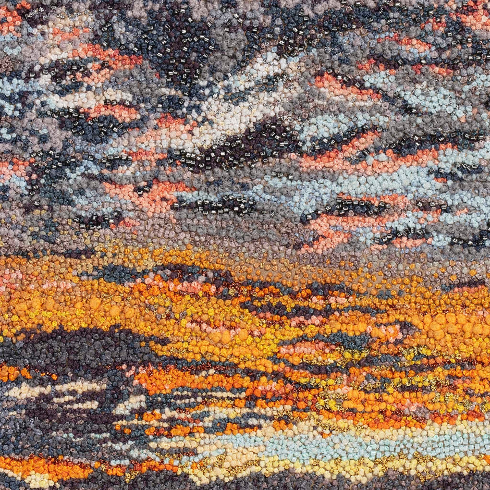 June Sky hand embroidered leather wall art.
