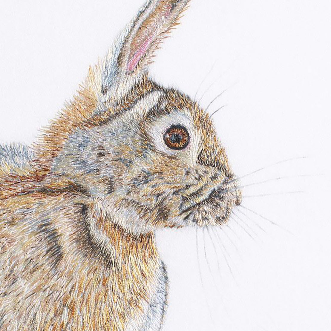 Hand embroidered rabbit close up