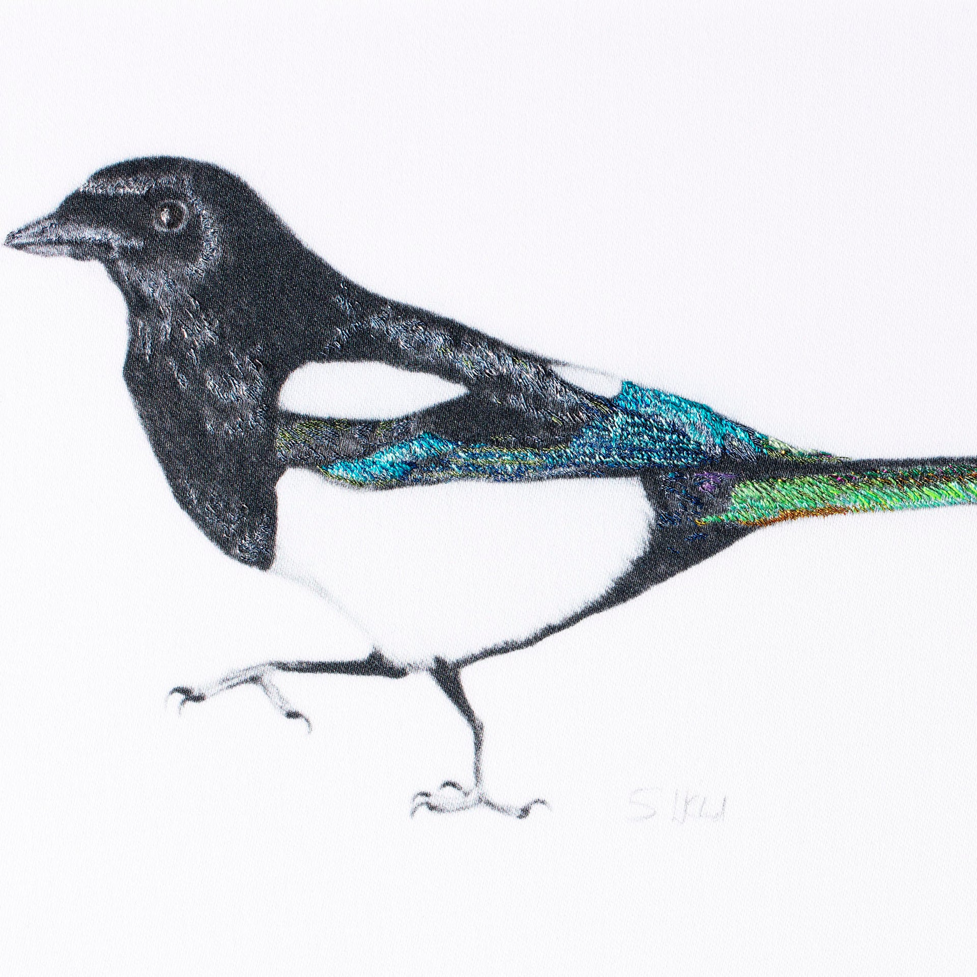 Magpie hand embroidered artwork.