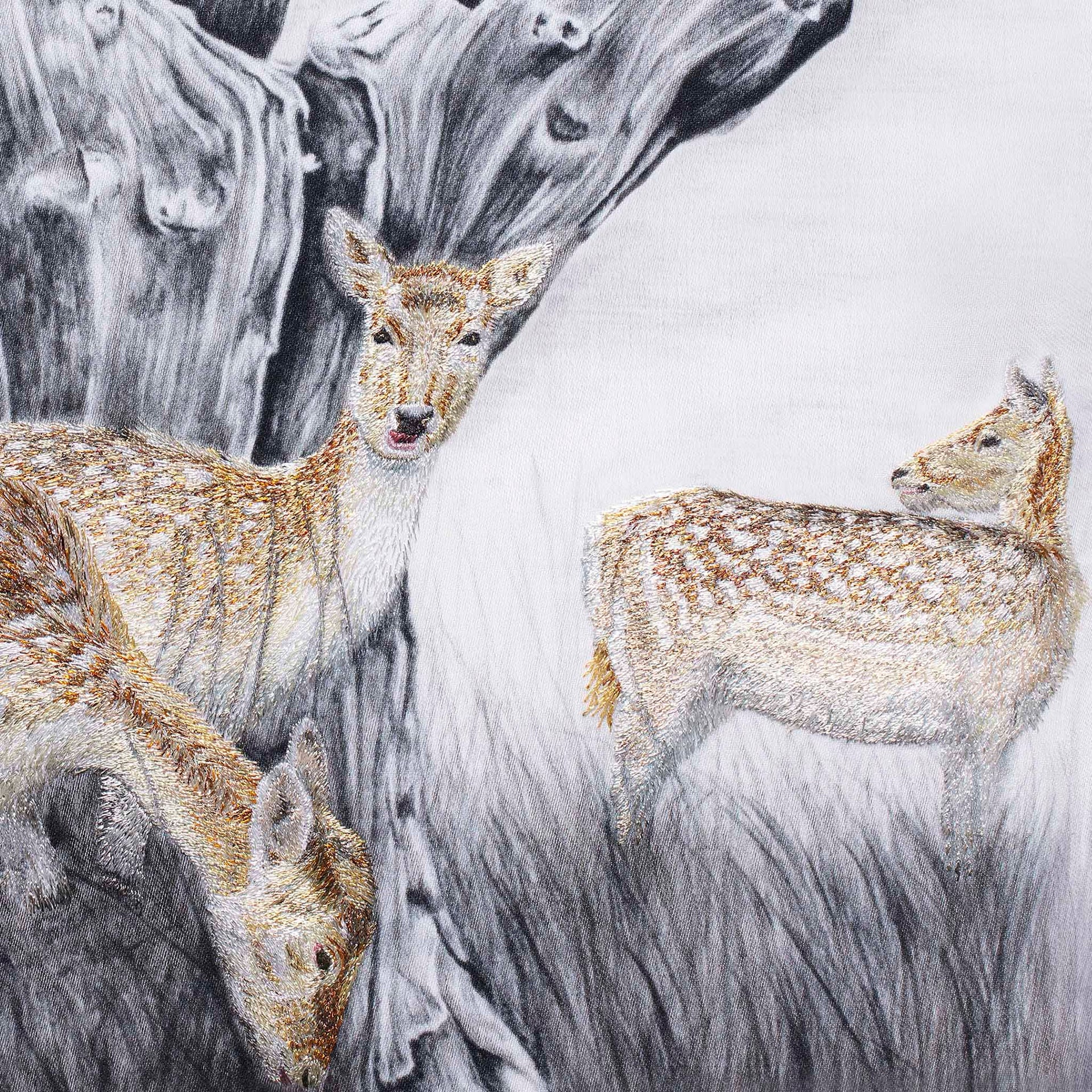 Deer hand embroidered wall art close up.