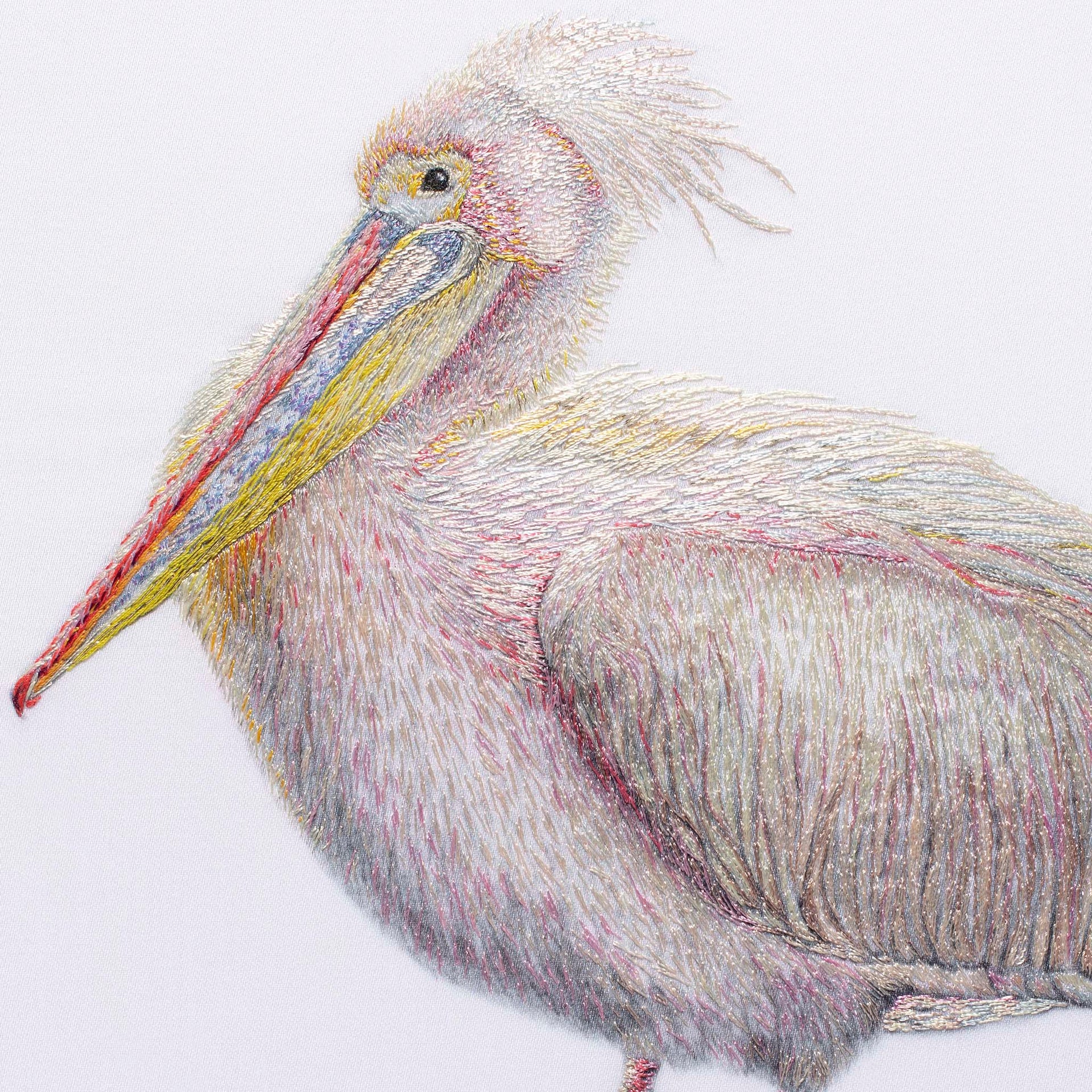 Pelican hand embroidered wall art close up.