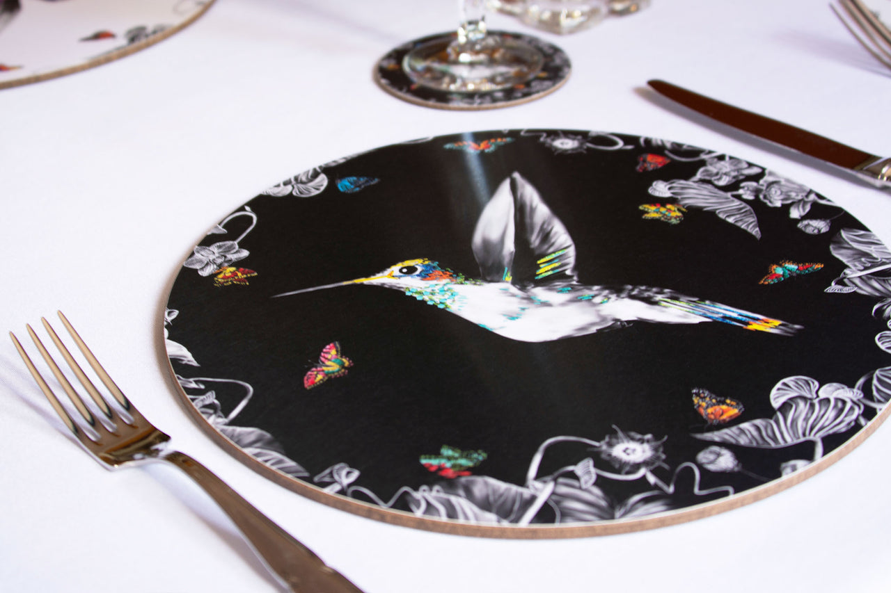 Black hummingbird placemat on the table