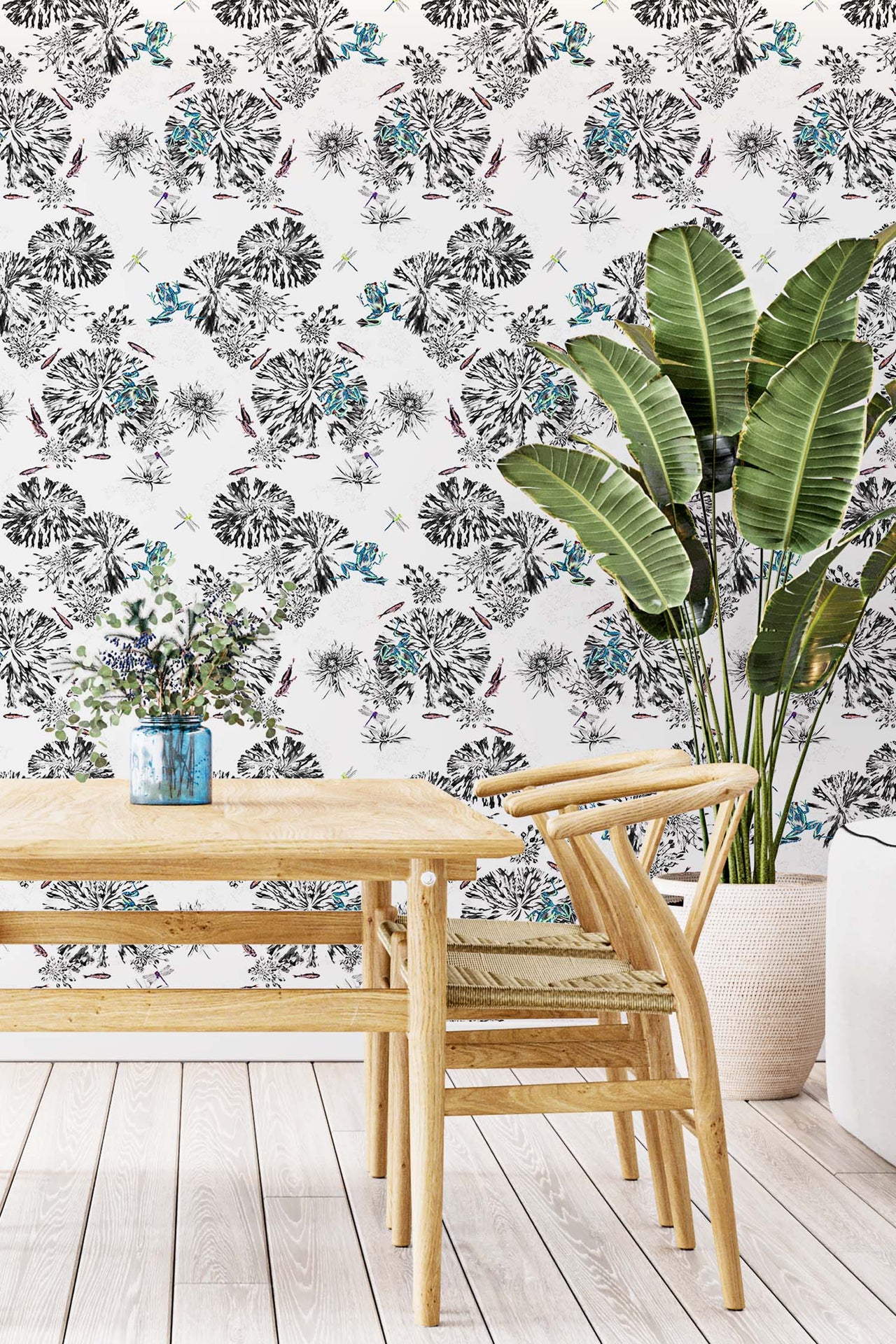 Green frogs wallpaper on the wall in a dinning room.