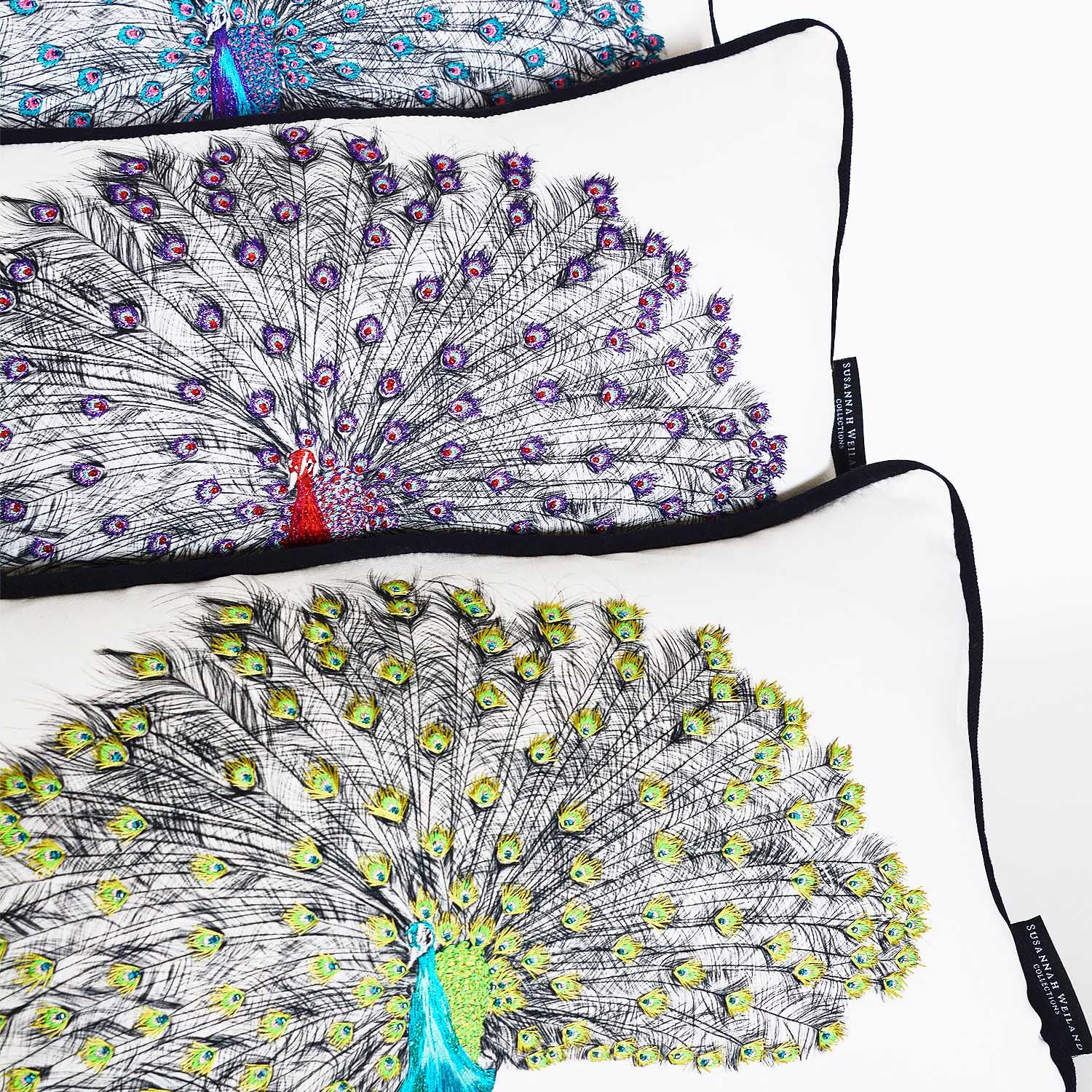 Peacock hand embroidered and beaded cushions.