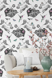 Pink hummingbird wallpaper in sitting room.