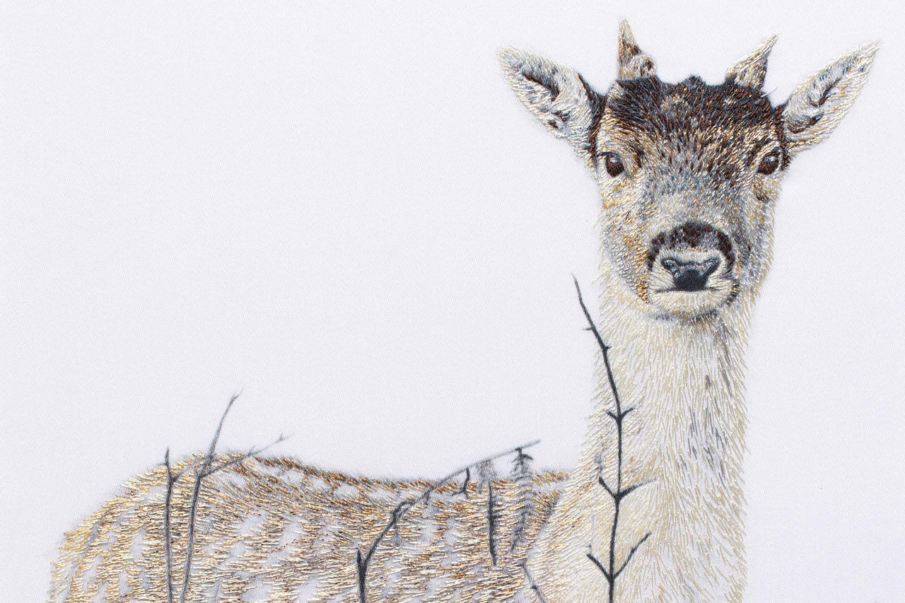 Young deer hand embroidered artwork.