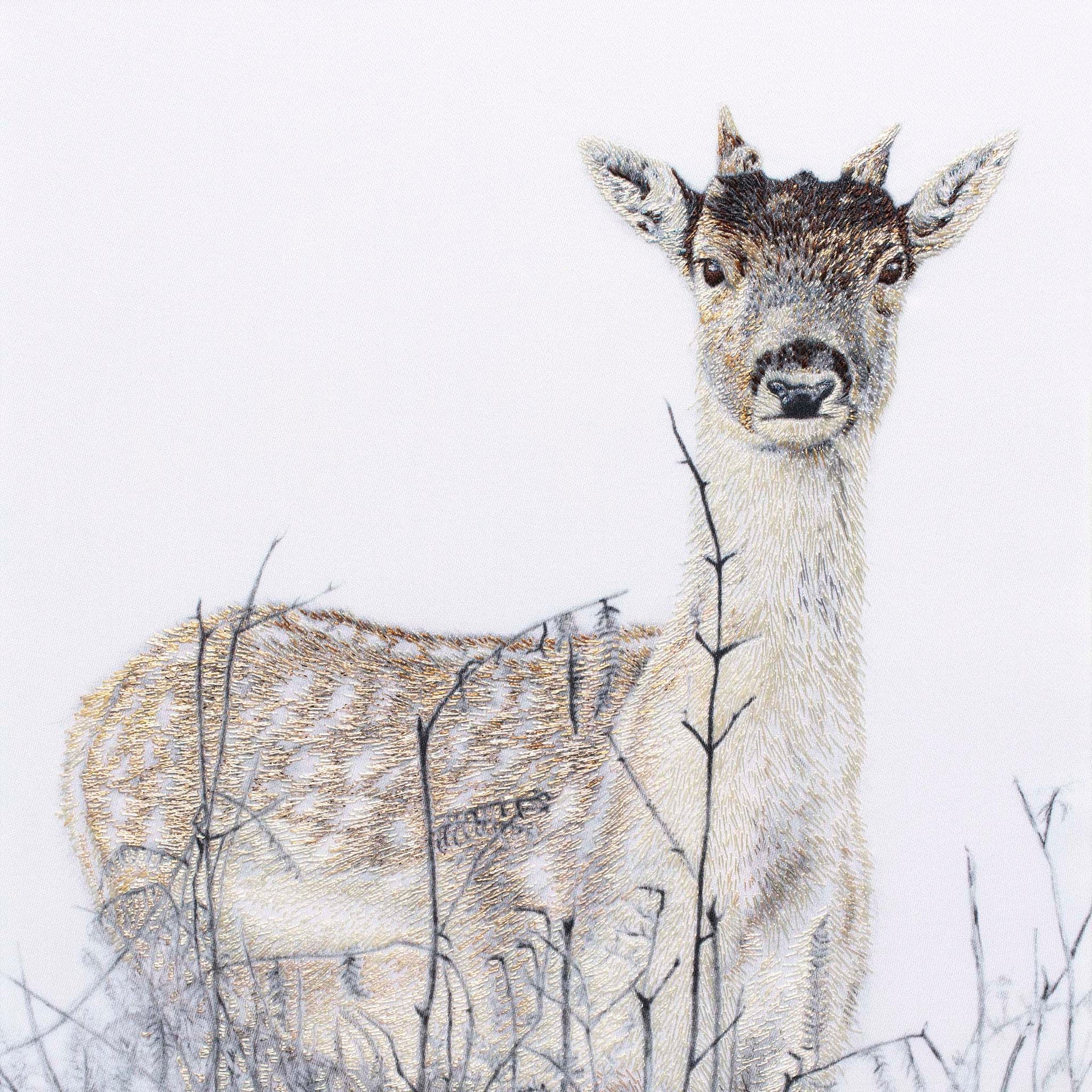 Deer hand embroidered artwork.