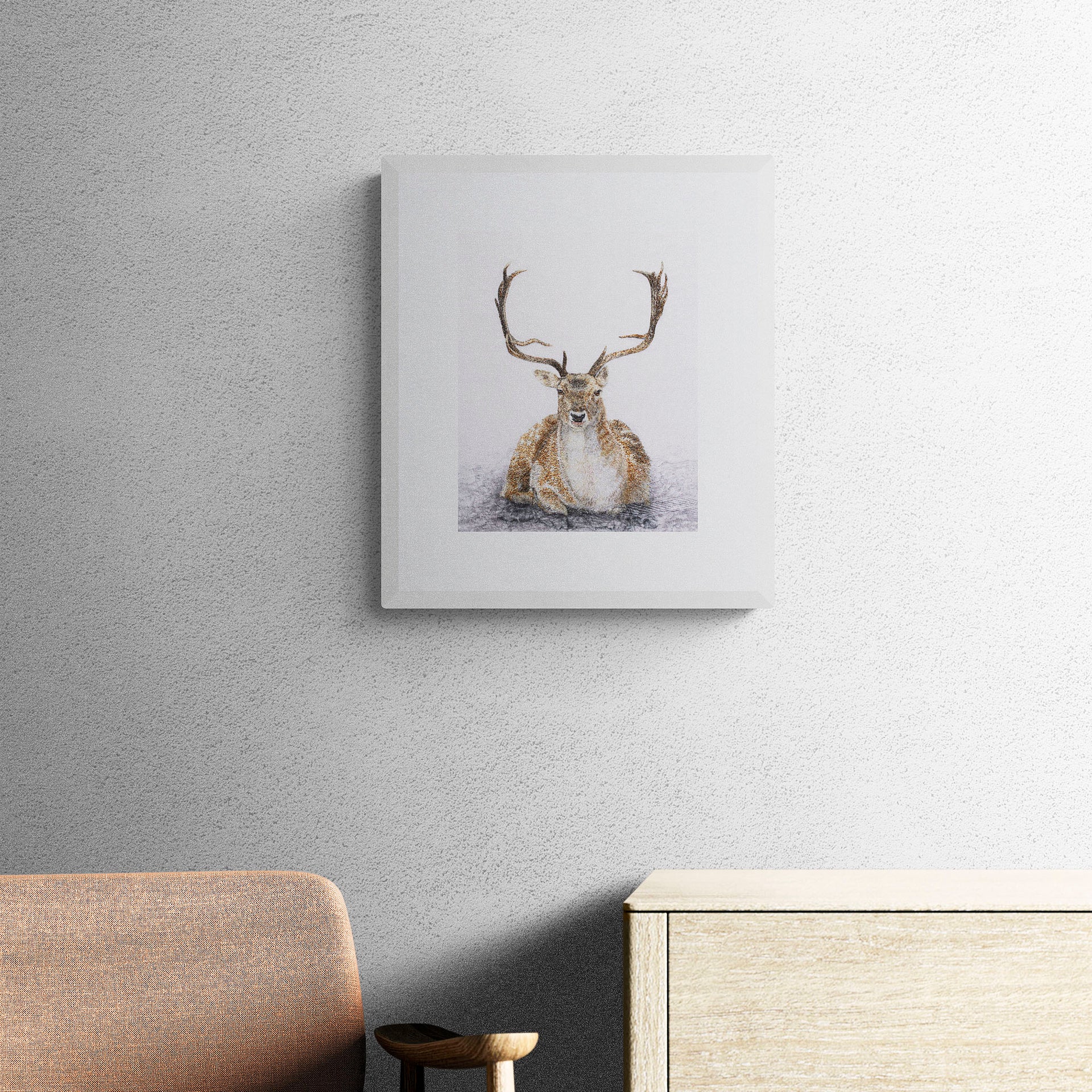 Hand embroidered siting deer limited edition print on wall
