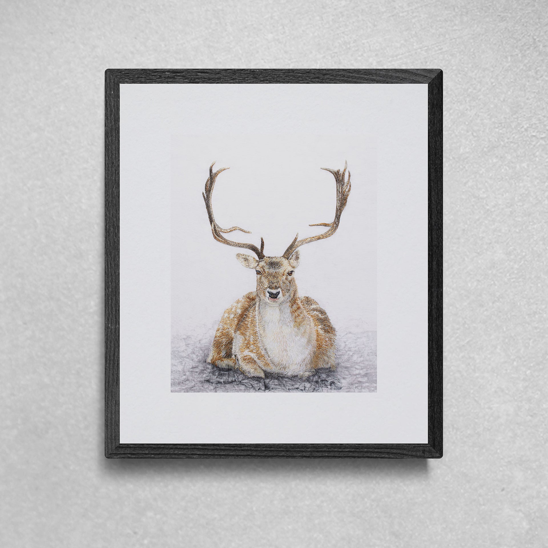 Hand embroidered siting deer limited edition print in black frame