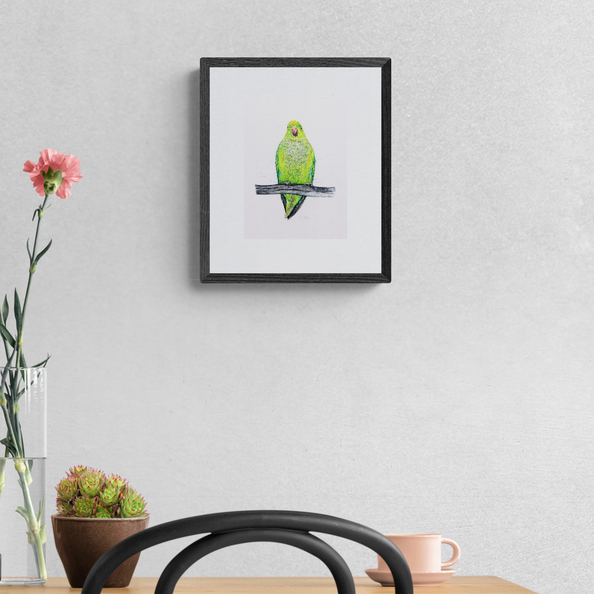 Hand embroidered parakeet in black frame
