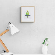 Hand embroidered parakeet in wooden frame