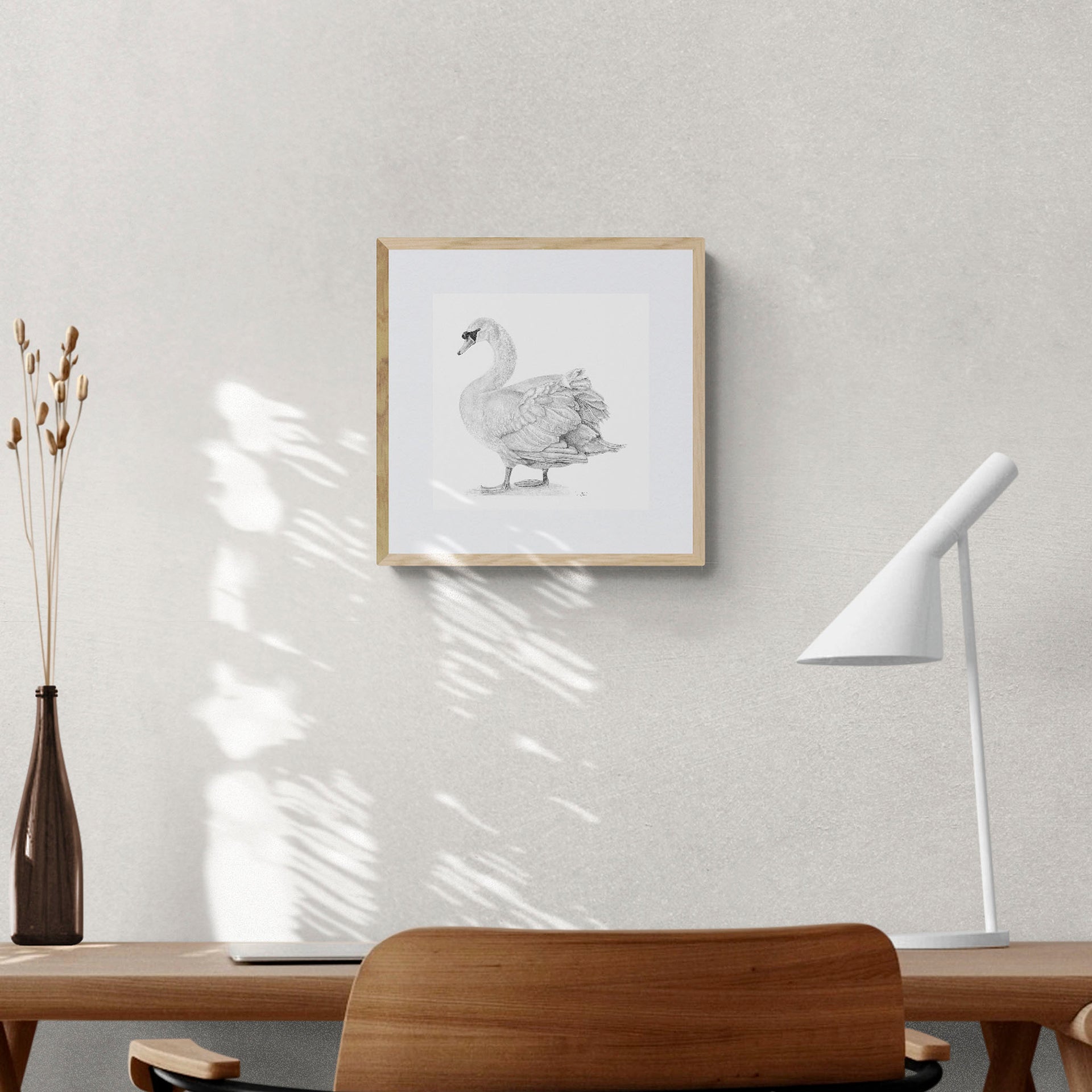 Giclée Print of Hyde Swan Pencil Drawing in frame on the wall