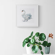 Swan hand embroidered limited edition print in frame on the wall