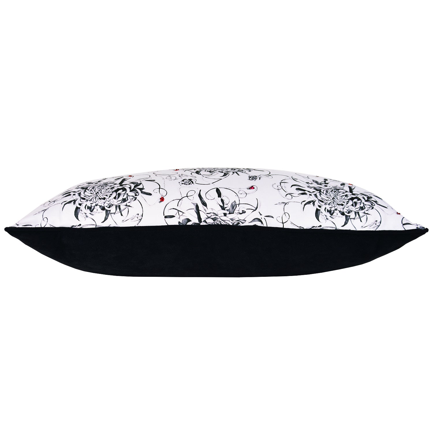 Monochrome floral bolster cushion with hand embroidered ladybirds  side view