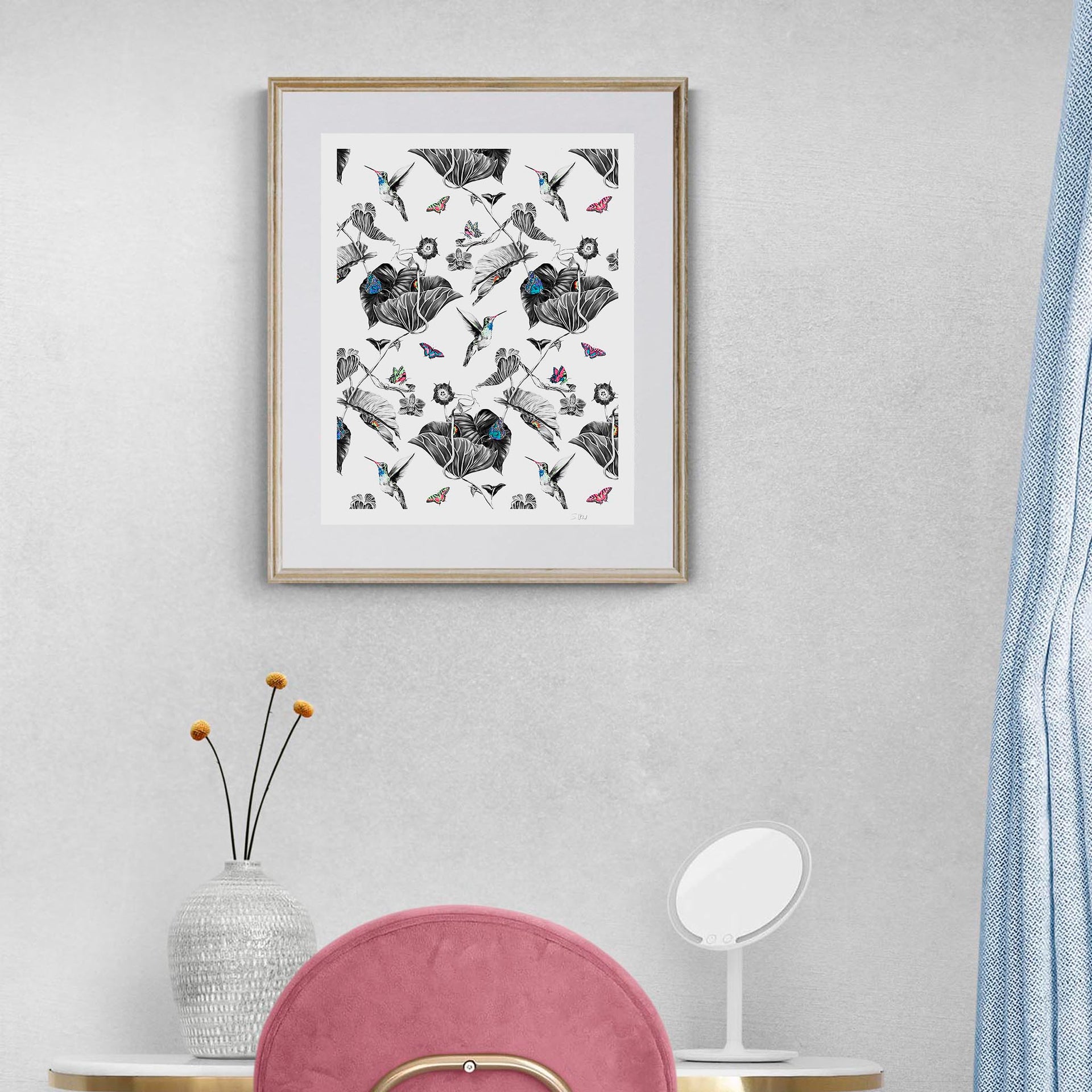 Hummingbird limited edition print in frame on wall