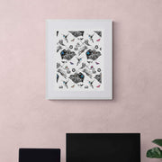 Hummingbird limited edition print in white frame on pink wall