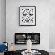 Hummingbird limited edition print in black frame on wall