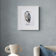 Heron hand embroidered limited edition print in white frame on the wall