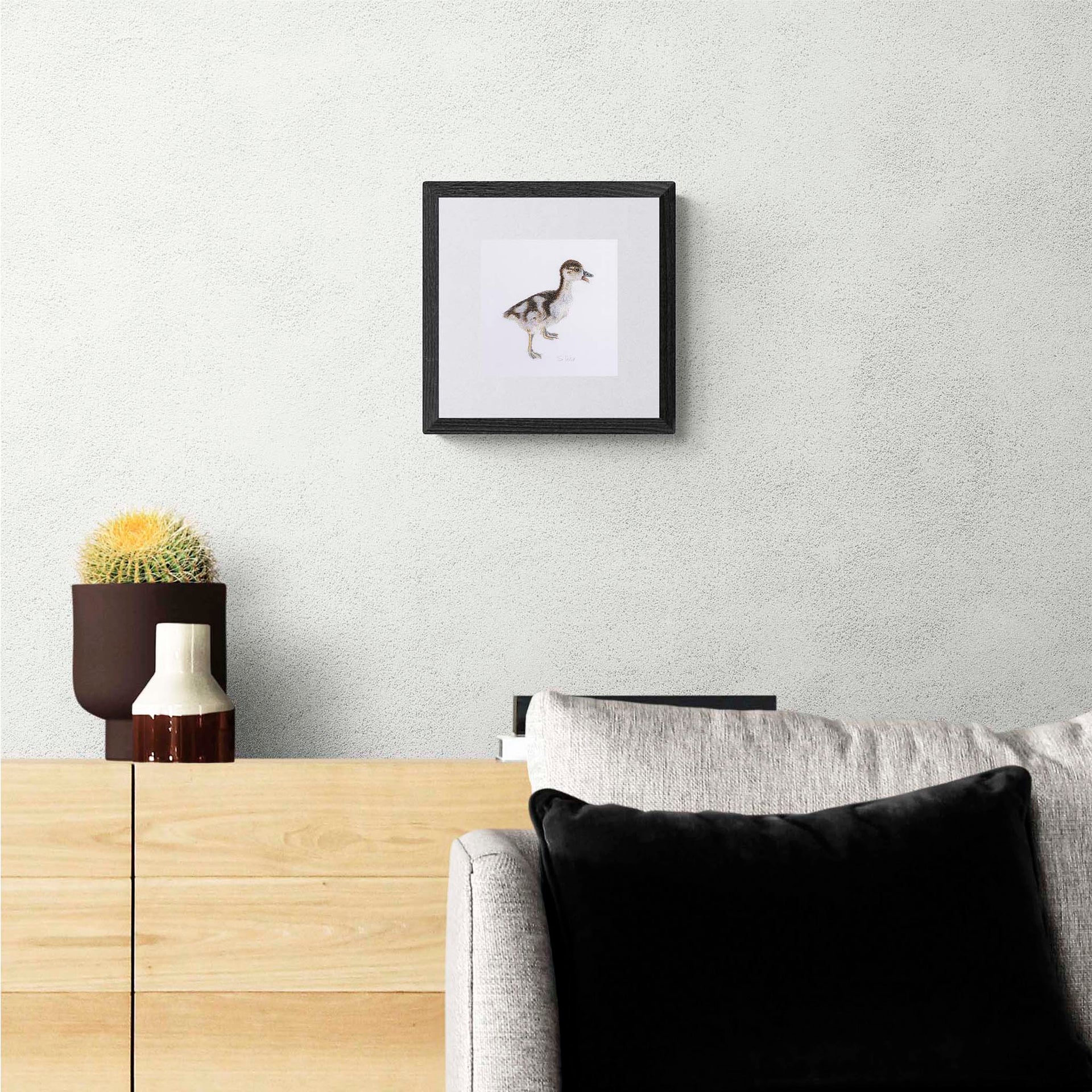 Gosling hand embroidered limited edition print in frame on the wall