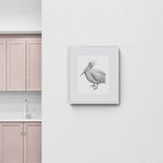 Pelican pencil drawing print in white frame on the wall