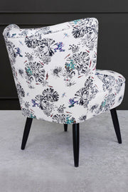 cocktail chair with multi frogs on a lily pad fabric back view