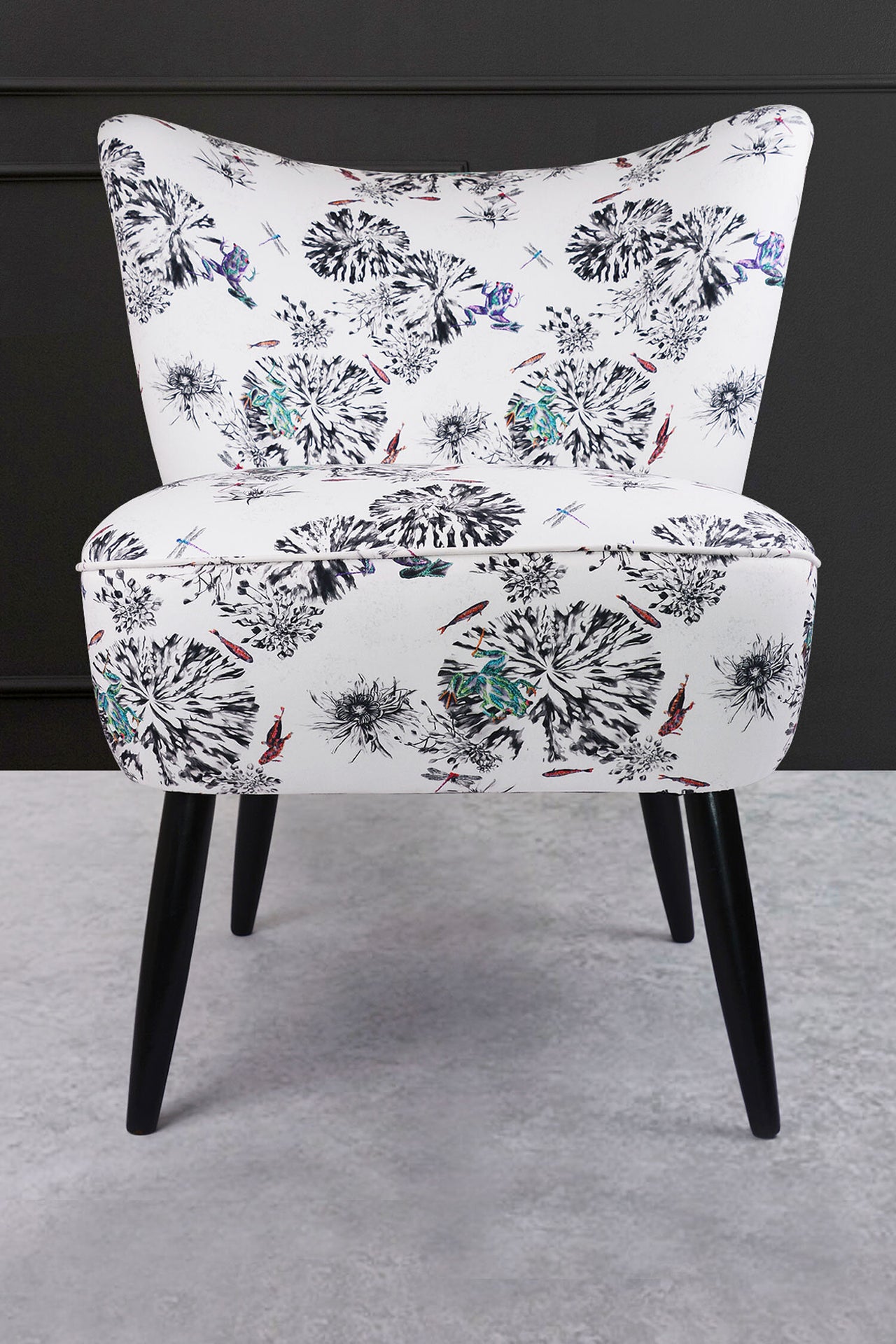 cocktail chair with multi frogs on a lily pad fabric front view