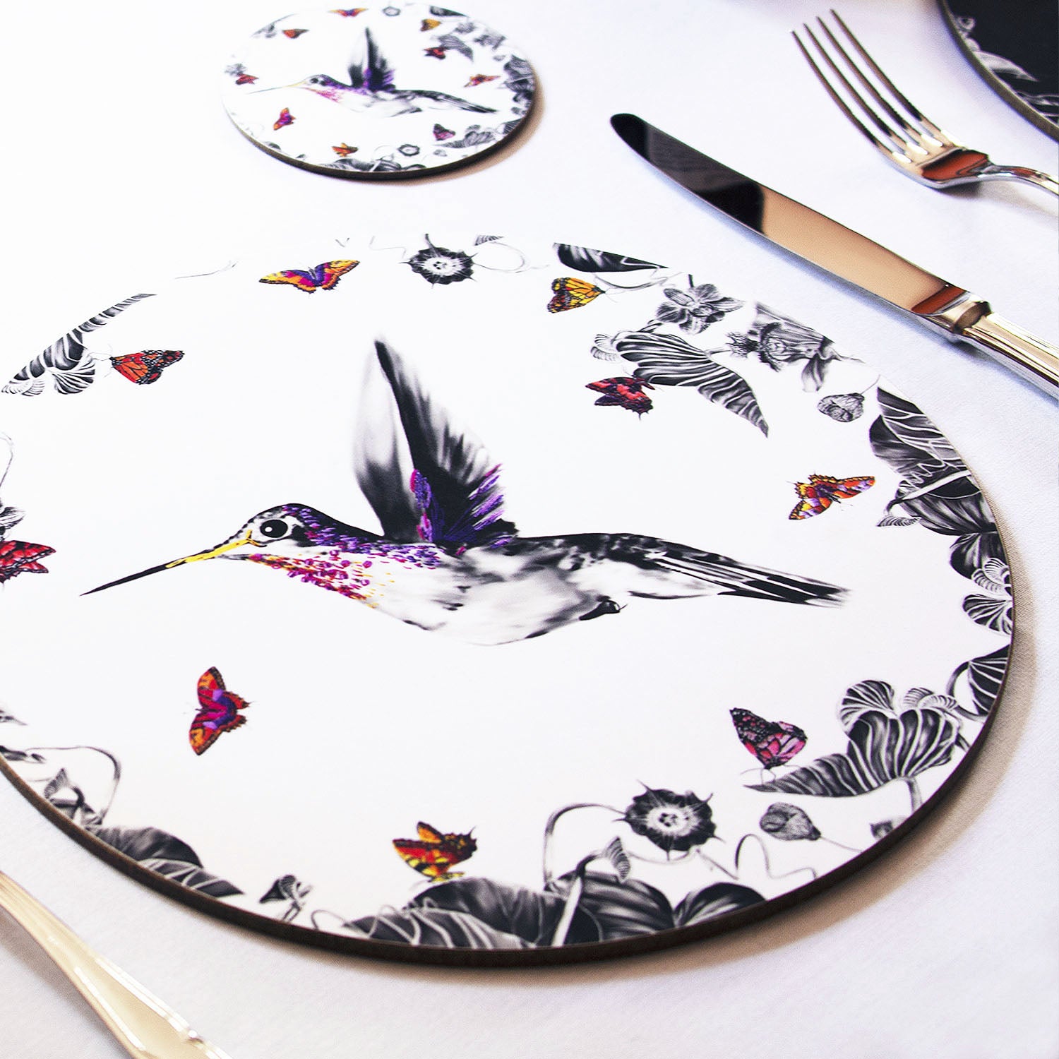 White hummingbird placemat on the table