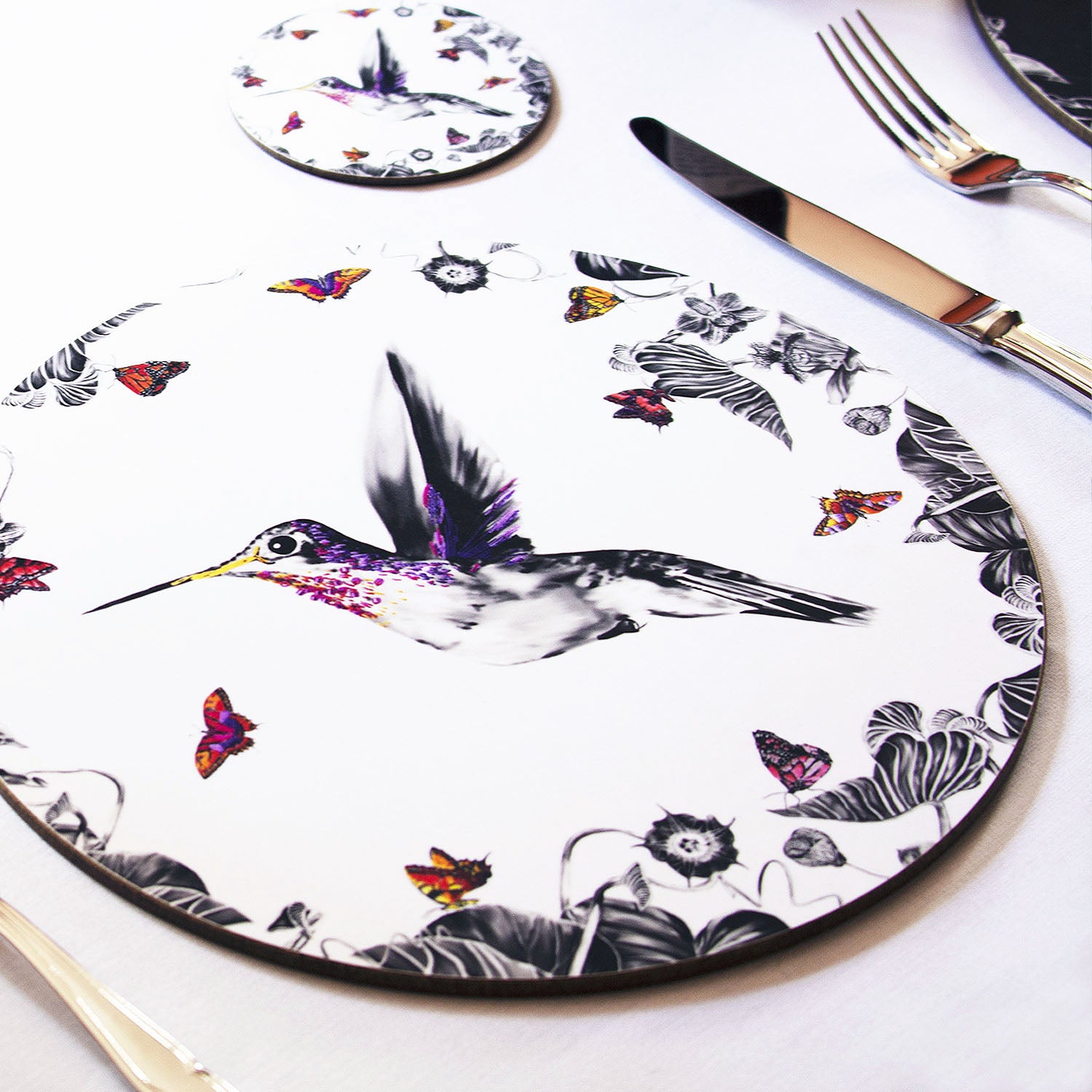 White hummingbird placemat in table setting