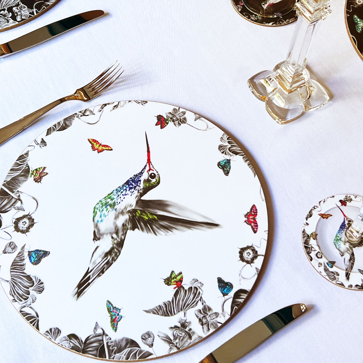 White hummingbird placemat on the table