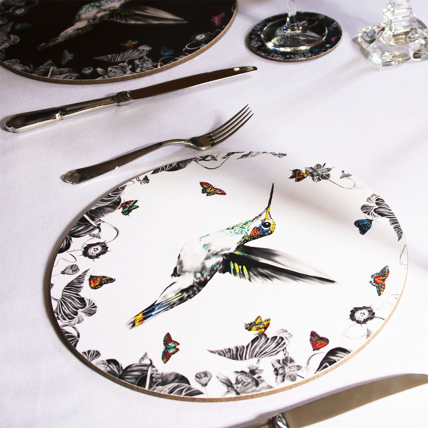 White hummingbird placemat in table setting