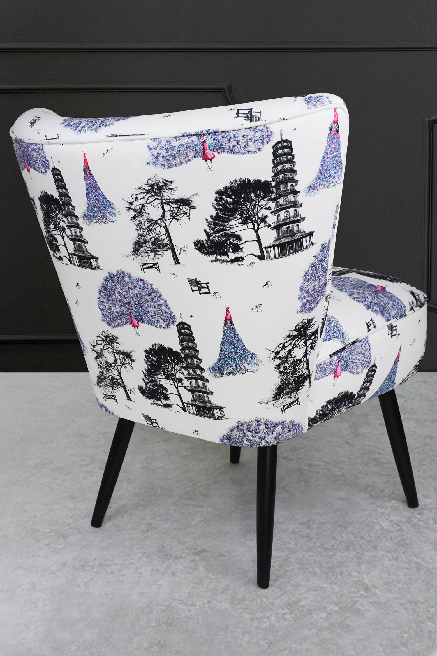 cocktail chair with pink peacocks fabric back view