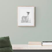 Deer pencil drawing art print in frame on the wall